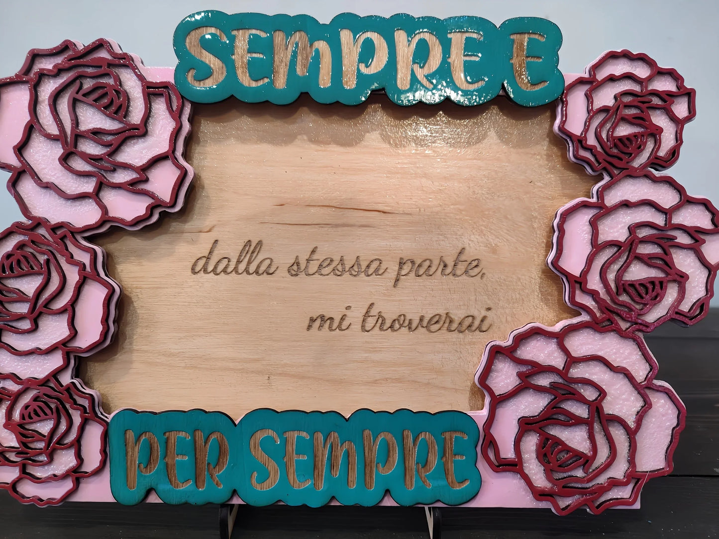 Decorative wooden plaque with pink roses and Italian text, teal and gold SEMPRE E PER SEMPRE.