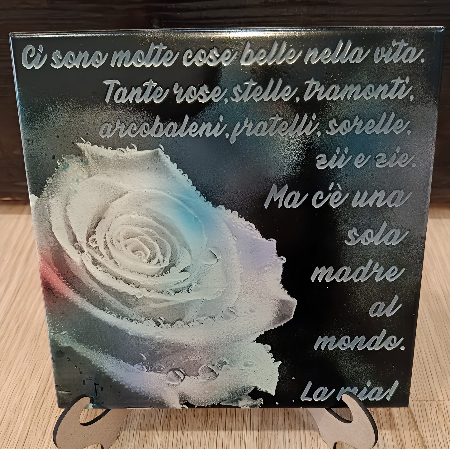 Decorative plaque with Italian quote and white rose for mother's day gift on wooden stand