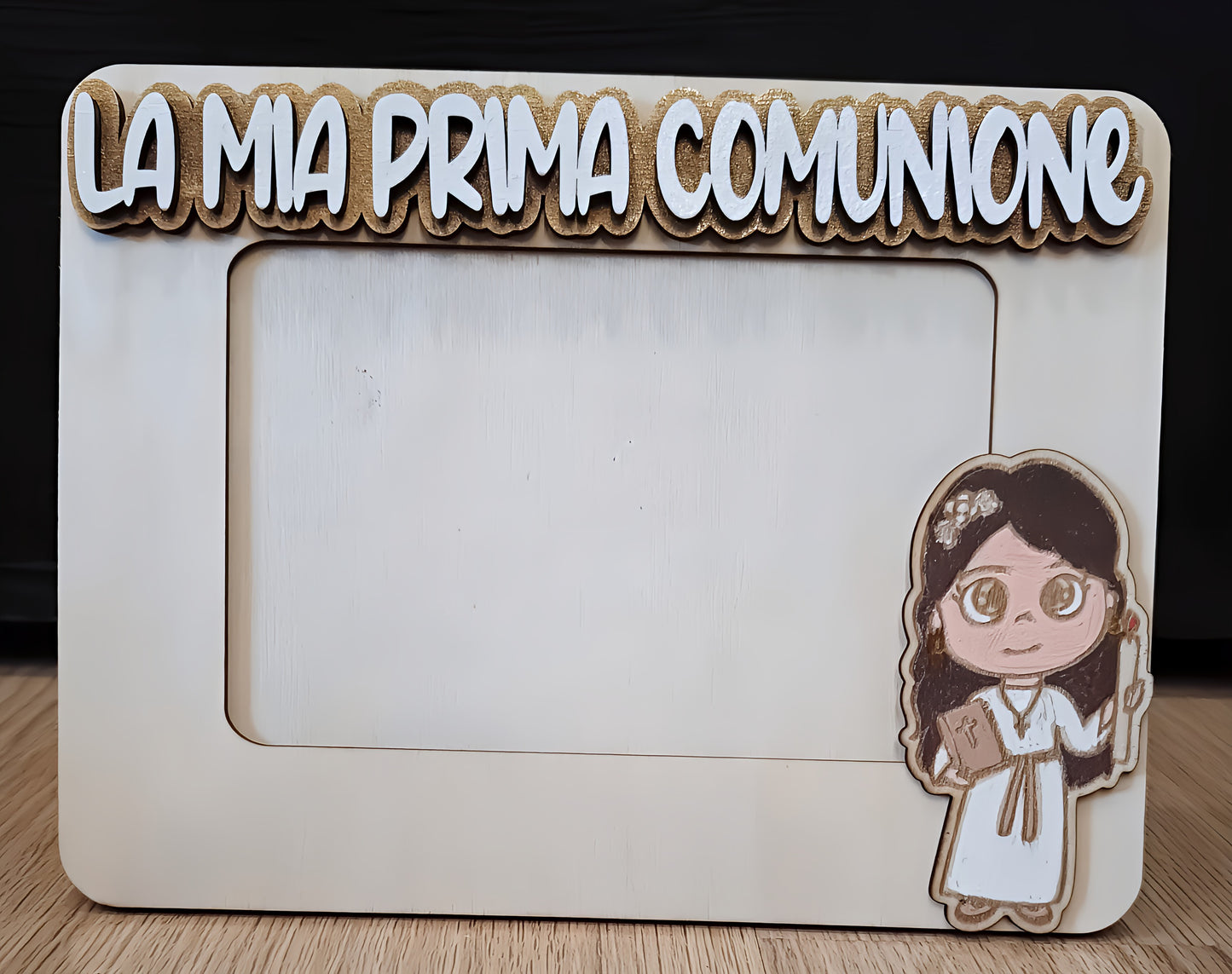 Wooden photo frame with 'La mia Prima Comunione' text and cartoon girl in communion dress