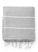Folded gray Turkish towel with white stripes and fringed edges