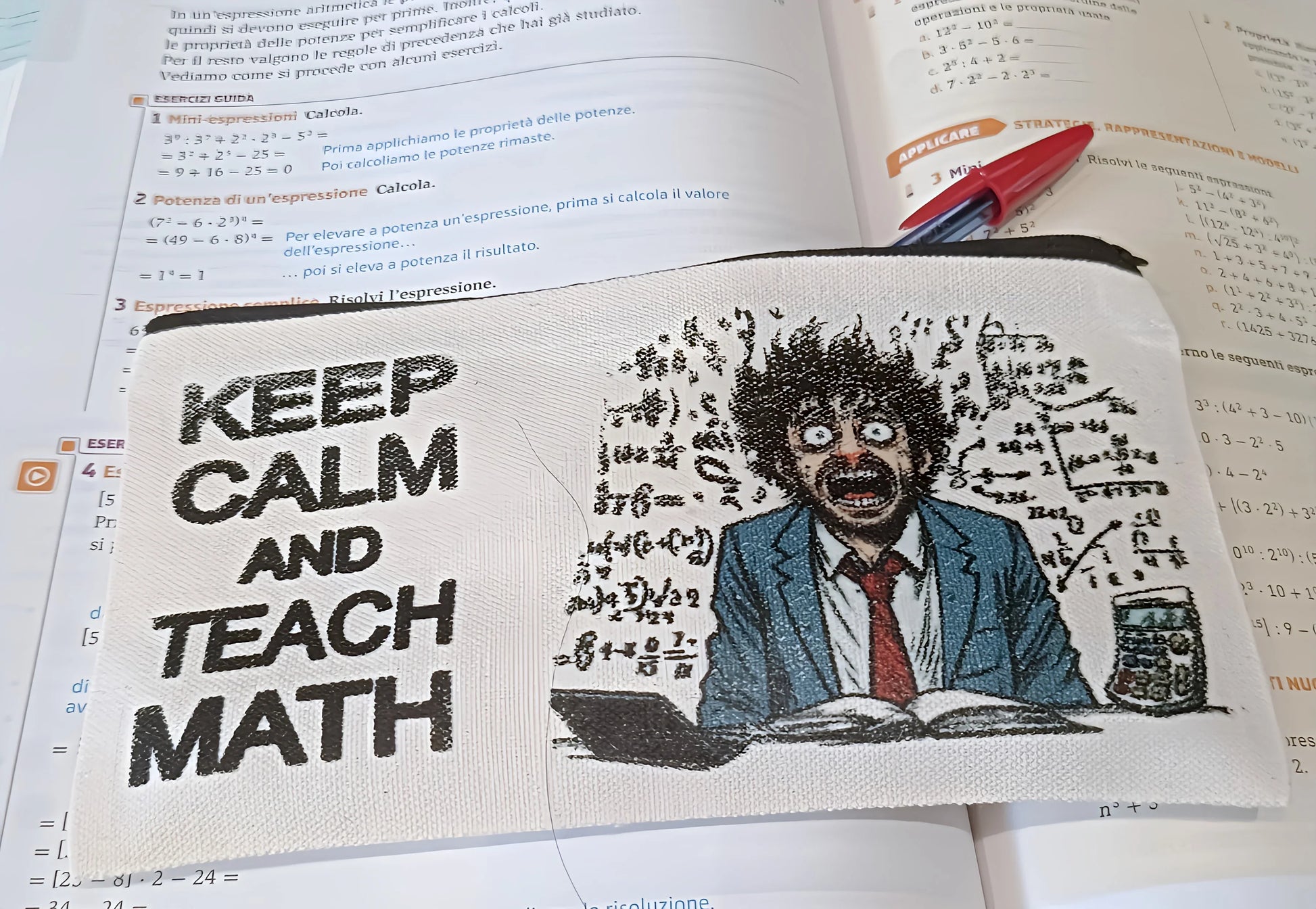 Pencil case with 'Keep Calm and Teach Math' text and cartoon teacher over math textbook