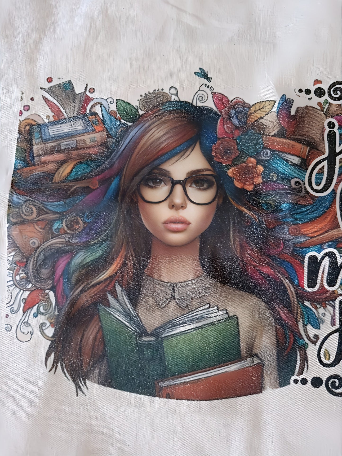 Illustration of a woman with glasses, colorful hair, and books, holding an open green book