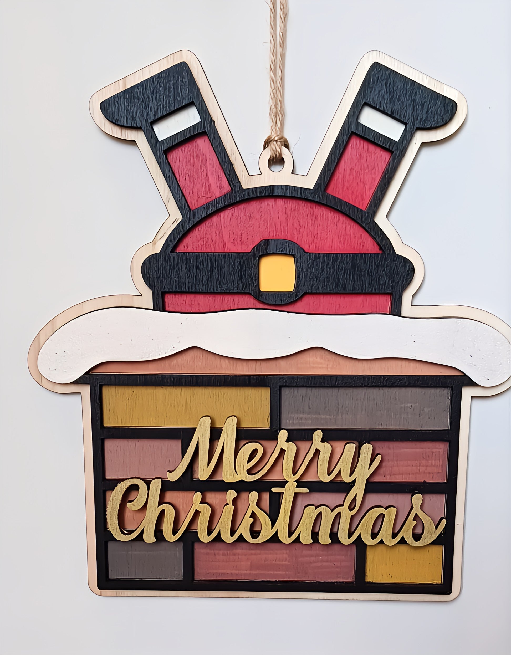 Wooden Merry Christmas sign with Santa legs in a brick chimney ornament