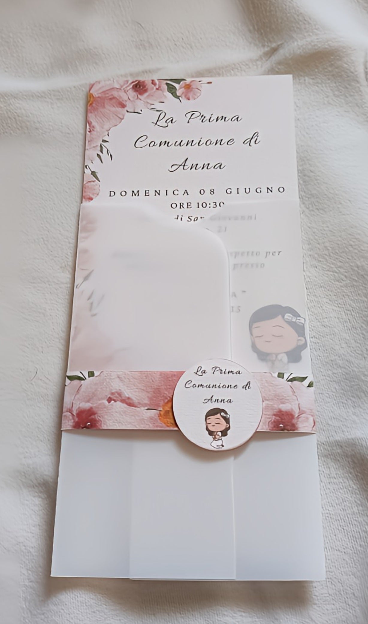 First Communion invitation card with pink floral border and cartoon girl illustration