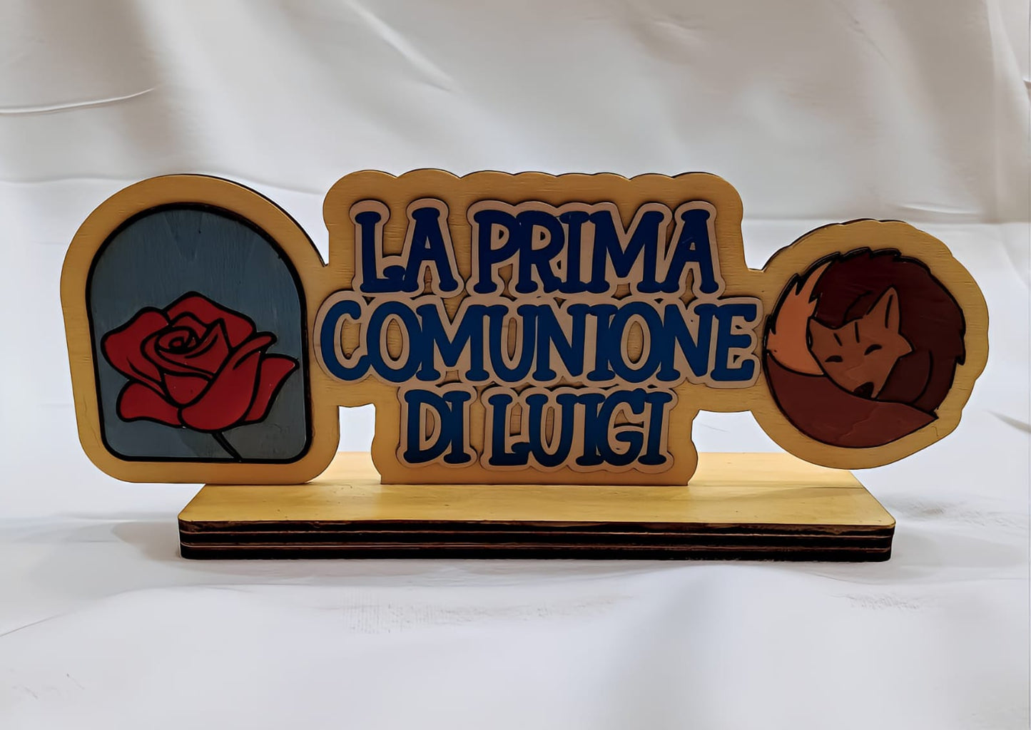 Wooden plaque with 'La Prima Comunione di Luigi', red rose, and sleeping fox design