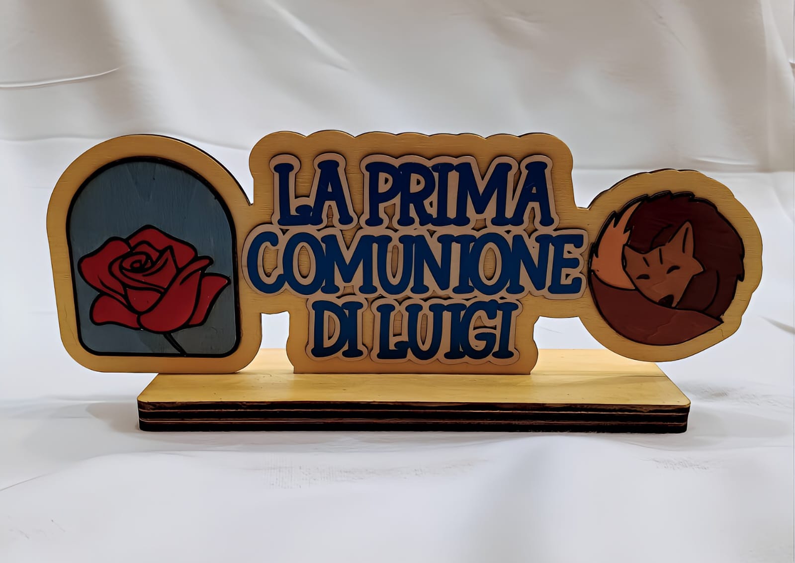 Wooden plaque with 'La Prima Comunione di Luigi', red rose, and sleeping fox design